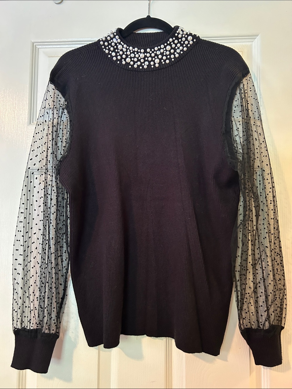 Belldini Black Sweater with Sheer Polka Dot Sleeves and Embellished Collar